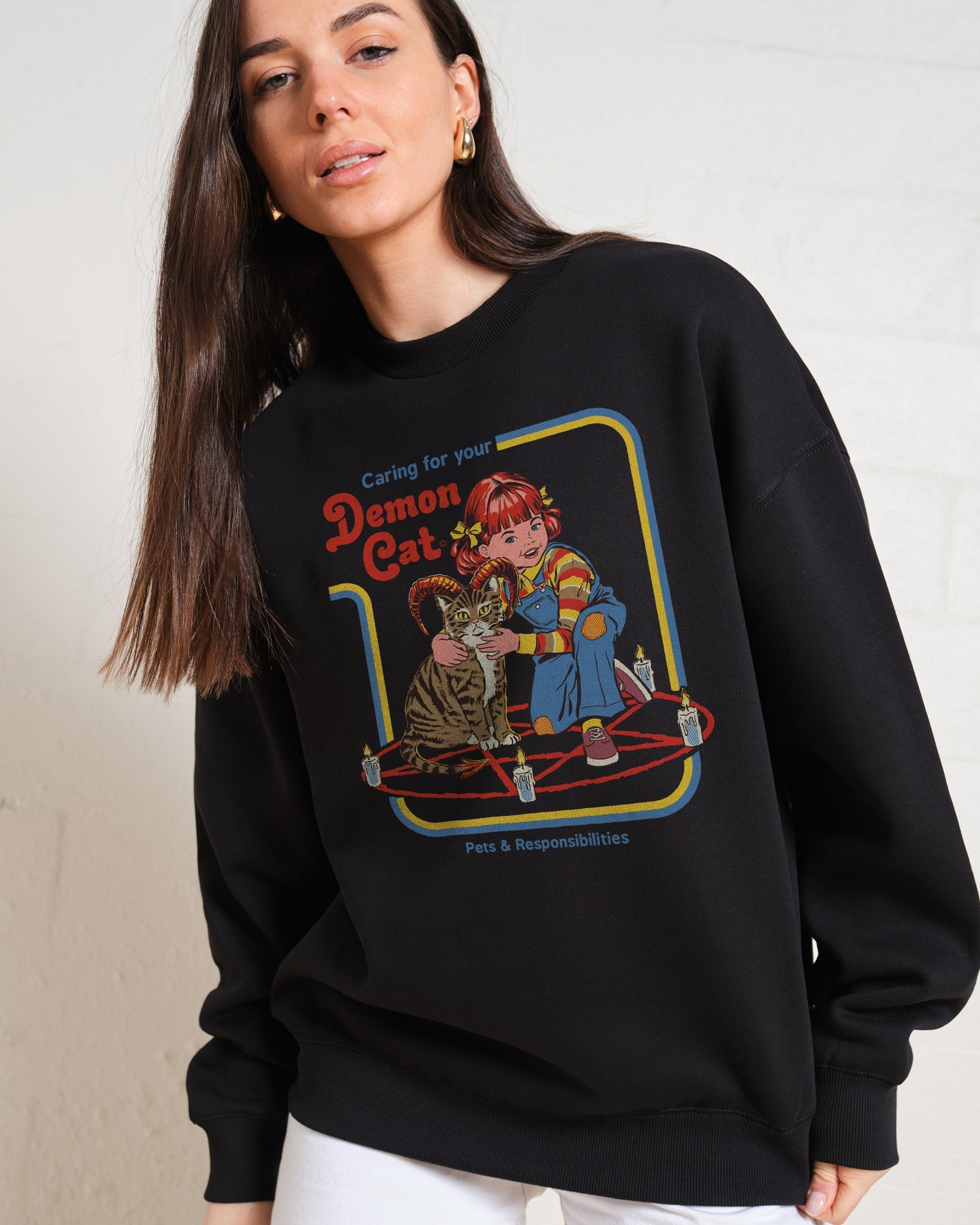 Caring for Your Demon Cat Sweatshirt by Steven Rhodes Unisex Graphic